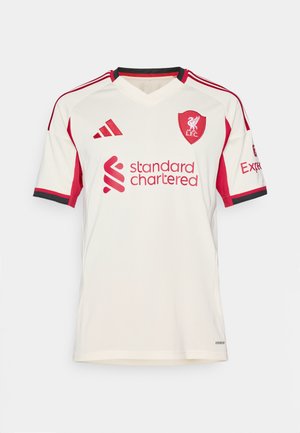 Valge lühikeste varrukatega jalgpallisärk punaste aktsentidega, v-kaelusega, punaste triipudega varrukatel ja "Standard Chartered" logoga. Rinnal L.F.C. embleem.