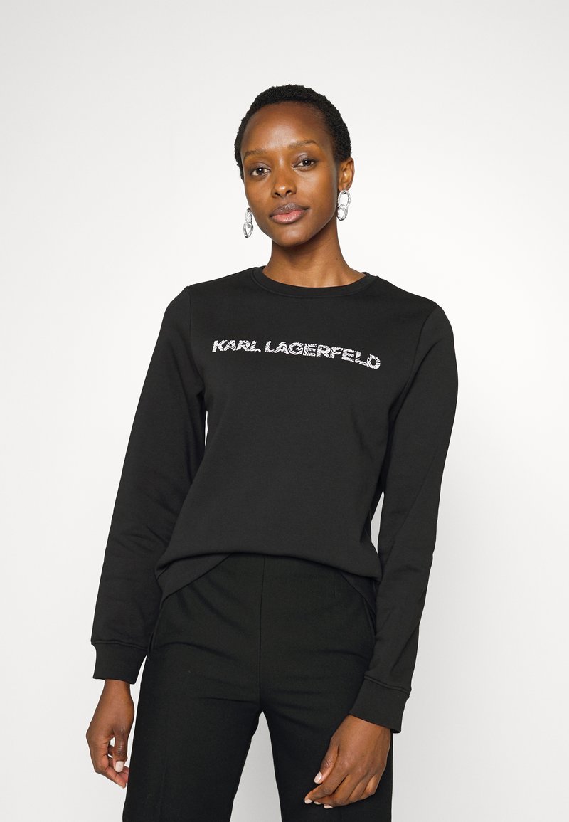 Damen Sweatshirts | KARL LAGERFELD ELONGATED LOGO ZEBRA Sweatshirt black/schwarz - KF66083 Damen Sweatshirts | KARL LAGERFELD ELONGATED LOGO ZEBRA Sweatshirt black/schwarz - KF66083