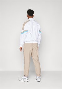 Diadora TRACK PANTS ICON - Jogginghose - humus