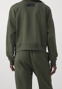Under Armour Felpa - green