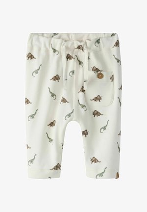 Białe spodnie dla niemowląt z szarymi i brązowymi wzorami dinozaurów, regulowany pas ze sznureczkami oraz mała kieszonka na guziki po prawej stronie.