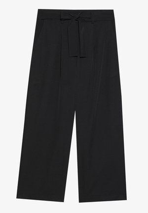 Pantalons larges noirs avec taille nouée, présentant une texture lisse et deux poches latérales, conçus dans une silhouette surdimensionnée.