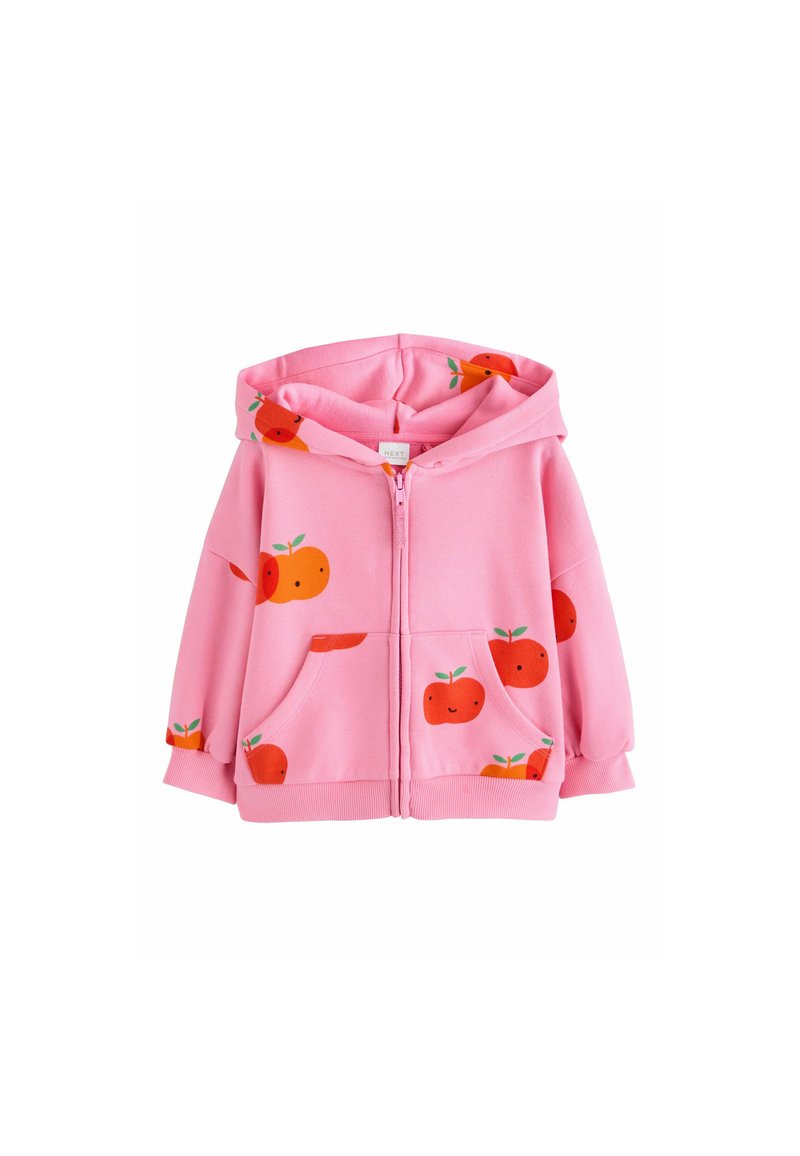 Rosa Kapuzenjacke mit Reißverschluss aus weichem Stoff, mit einem wiederholten Muster von orangen Äpfeln mit grünen Blättern an den Ärmeln und Taschen.