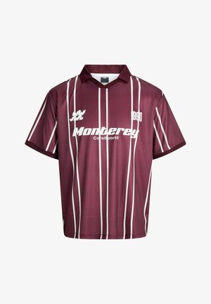 Maroon short-sleeve sports shirt with white vertical stripes, collar, and text "Monterey CoreSport©" and "1990" on the front.