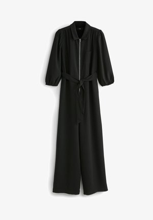 Zwarte jumpsuit met lange mouwen, kraag, ritssluiting aan de voorkant, borstzakje, elastische manchetten en stoffen ceintuur gestrikt in de taille.