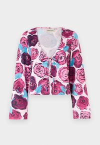 Floral cropped top featuring a pink background with vibrant rose patterns in shades of burgundy and blue, with long bell sleeves and a v-neckline.