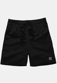 Shorts de baño negros hechos de un tejido ligero, con una cintura elástica y cordón, y un logo blanco en la parte inferior de la pierna derecha.