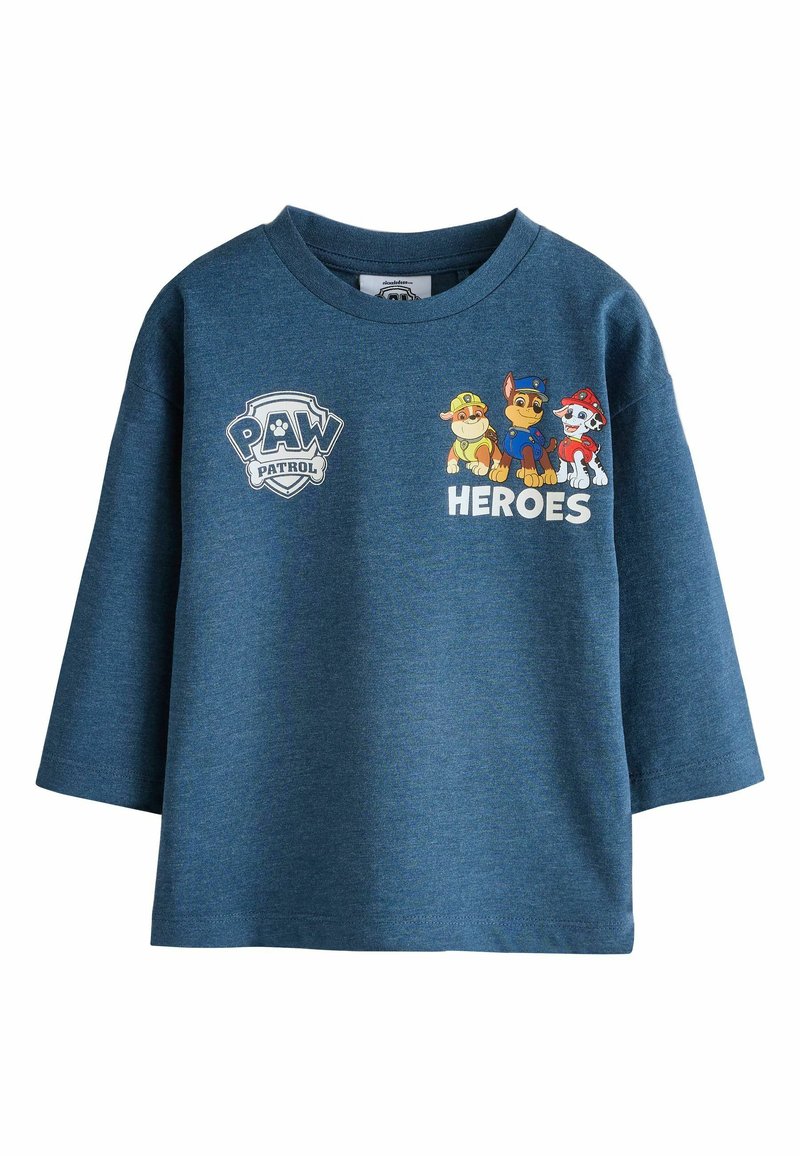 Blå långärmad barnskjorta med Paw Patrol-logotyp och tecknade valpar i uniform ovanför ordet "HJÄLTAR" på framsidan.