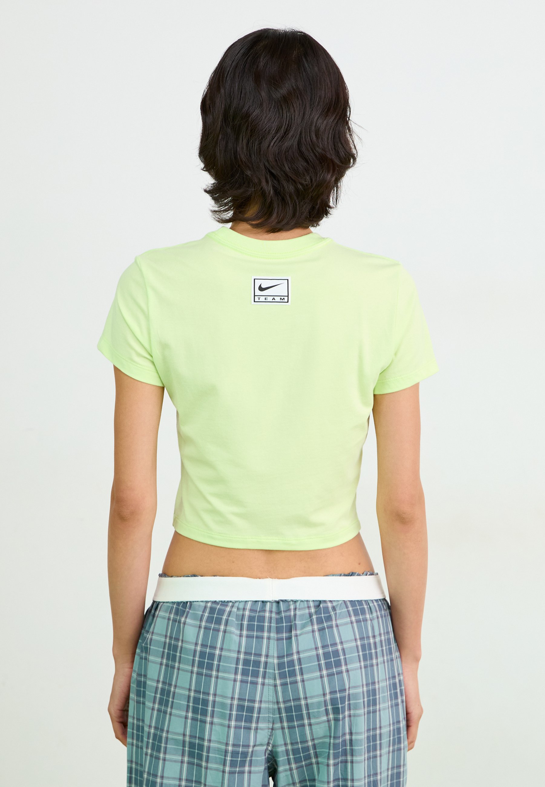 売れ筋商品|||ナイキ Tシャツ レディース トップス SLIM CROP TEE STREET - Print T-shirt - lime Nike Street graphic cropped t-shirt in lime green | ASOS