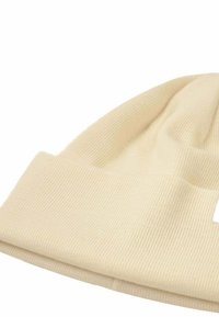 Cream-colored knitted beanie with a folded brim, made of ribbed fabric, displayed on a white background.