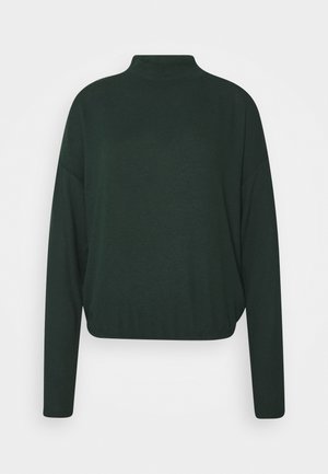 Pull vert foncé à manches longues avec un col montant et une coupe légèrement ample, présenté sur un fond blanc uni.
