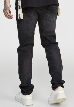 Vaqueros slim fit - black