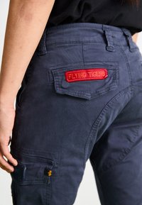 Alpha Industries PETROL PATCH - Cargo trousers - ultra navy