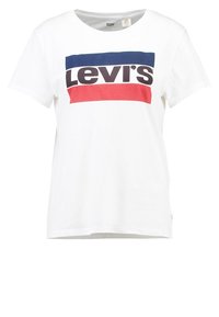 Camiseta de algodón blanca con un atrevido logo de Levi's en negro, rojo y azul en el pecho. Mangas cortas y cuello clásico de tipo crew.