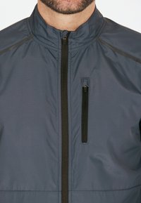 Endurance HUGOEE - Löparjacka - ombre blue