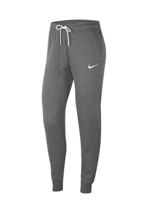 Pantalon de jogging gris foncé ajusté avec chevilles resserrées, cordon blanc, poches latérales et petit logo blanc Nike sur la cuisse gauche.