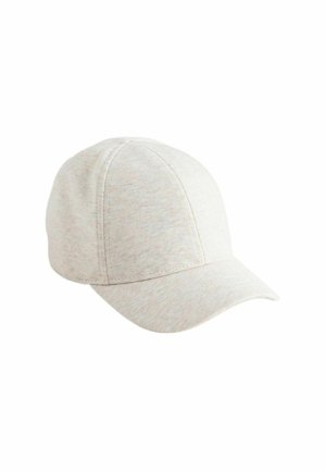 Gorra de béisbol beige clara con costuras visibles y visera curva, mostrada sobre un fondo blanco.