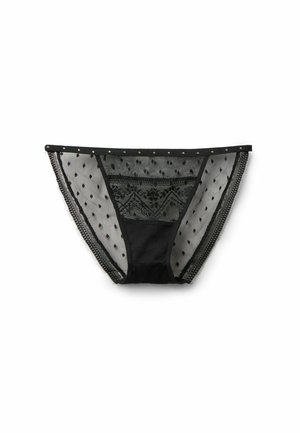 Sous-vêtements noirs présentant un design en mesh transparent avec des motifs à pois, des accents en dentelle, et des clous décoratifs le long de la ceinture.