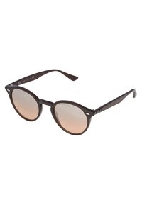 Ochelari de soare brown, rotunzi, cu lentile degrade și rame subțiri din plastic. Prezintă mici accente argintii aproape de balamale.