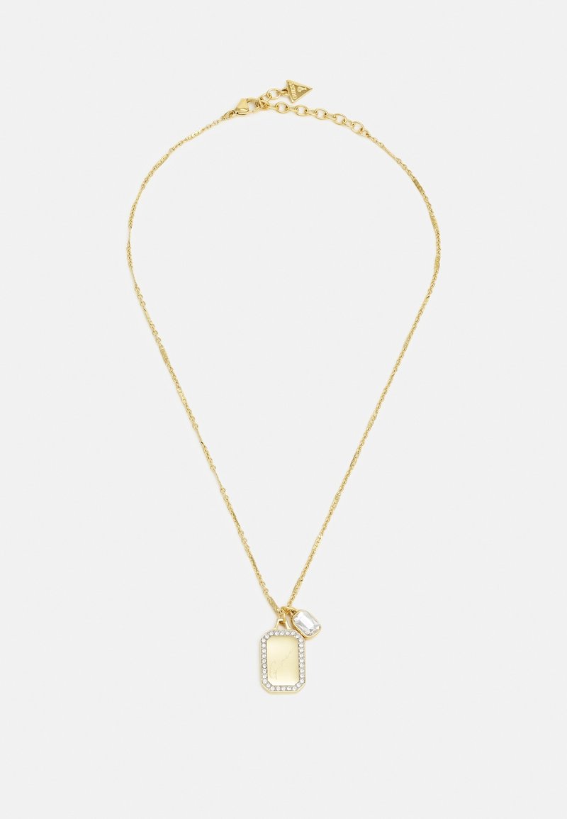 Collier délicat en chaîne d'or avec deux pendentifs, l'un rectangulaire avec de petites pierres claires et un petit joyau clair.