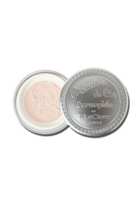 Powder in a round silver compact with textured lid and embossed text, featuring light pink, finely milled powder inside.