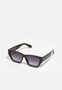 Black square sunglasses with gradient purple lenses. Thick frame, matte texture, and gold circular accents on the arms.