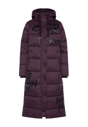 Long puffer coat in dark purple, featuring black graphic text, a hood, side pockets, and a zippered opening at the bottom.