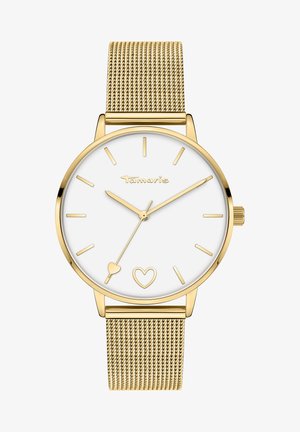 Gouden mesh bandhorloge met een witte wijzerplaat, voorzien van eenvoudige uurmarkeringen, een minutenwijzer en hartaccenten op de wijzerplaat.