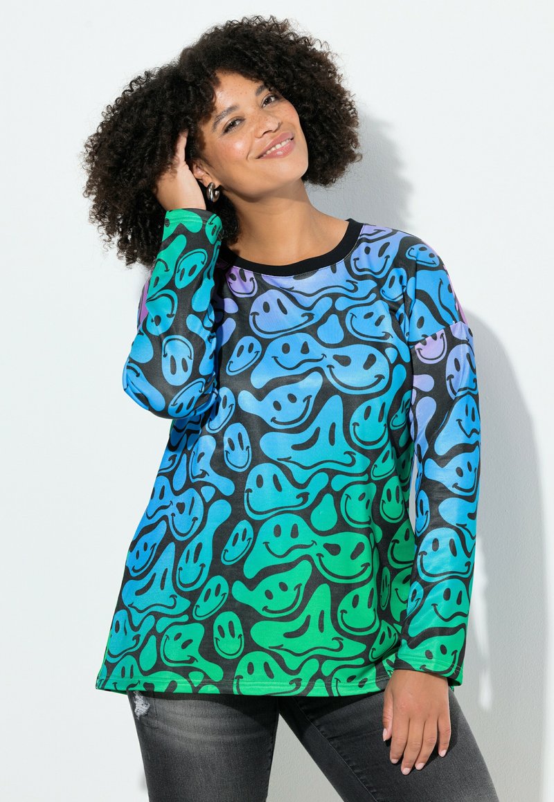 Maglietta a maniche lunghe con un motivo a gradiente di faccine sorridenti in blu e verde su sfondo nero, con scollo rotondo nero.