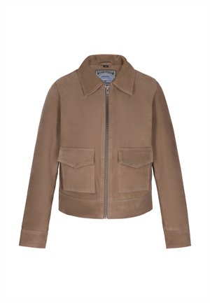 Brūns ādas jaciņa ar gludu tekstūru, ar apkakli, priekšējo rāvējslēdzi un divām krūšu kabatām. Iezīmēta ar īsu dizainu un minimālisma stilu.