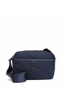 Borsa a tracolla blu navy in tessuto testurizzato, con tasca frontale con cerniera, tracolla regolabile e piccolo logo in rilievo.