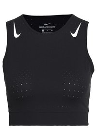 Top corto negro de Nike Aeroswift con un escote redondeado y pequeños agujeros de ventilación para mayor transpirabilidad, destacado por los logotipos del swoosh en blanco.