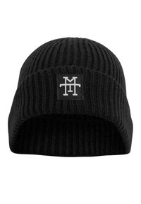 Black knitted beanie with vertical ribbing, featuring a black rectangular patch with a white logo on the front. Soft texture, fitted design.