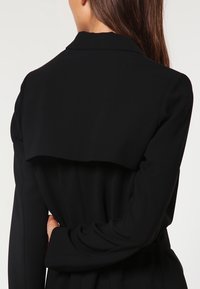 United Colors of Benetton Trenčkot - black