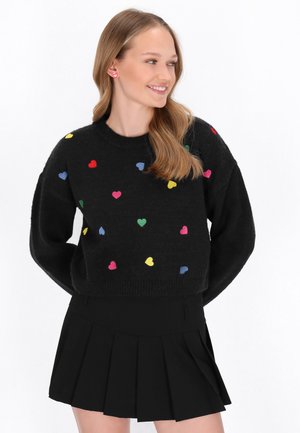 - Sweter