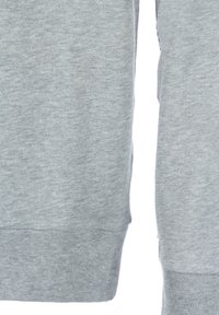 Tejido de sudadera gris claro con una textura suave. Presenta puños y dobladillo acanalados, con un diseño sencillo y sin adornos.