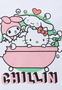 Graphic featuring cartoon characters in a pink bathtub filled with bubbles. Background includes a green circle; text reads "CHILLIN" in black.