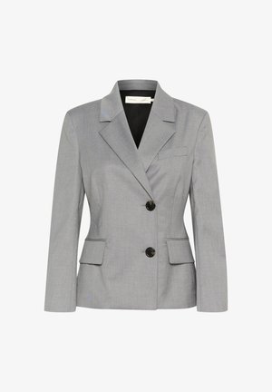 Szürke, szabott zakó, az elején bemetszett hajtókával, két elülső zsebbel és két fekete gombbal. Simább, könnyű anyagból készült.