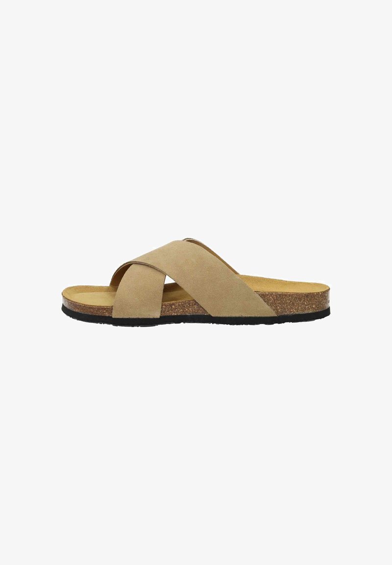 Beige cross-strap sandals with a suede-like upper, cork midsole, and black rubber outsole. Flat design for easy wearing.