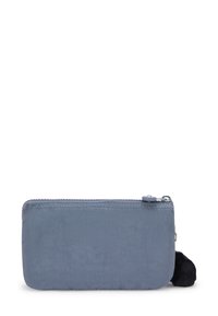 Blue fabric zip pouch with a smooth texture, featuring a black pom-pom accent. Simple rectangular design with a zip closure at the top.