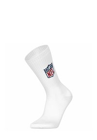 Calzini bianchi a crew con un bordo a coste e un colorato logo della NFL sul lato.
