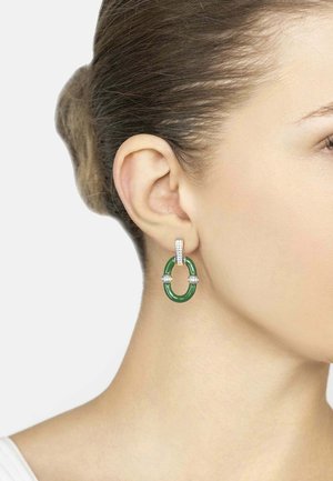 Green hoop earrings with clear cubic zirconia accents, featuring a smooth texture and a modern design.
