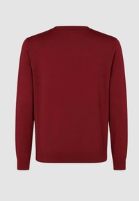 Maglione bordeaux con scollatura a girocollo, maniche lunghe e polsini e orlo ribattuti. Realizzato in un tessuto leggero e morbido.