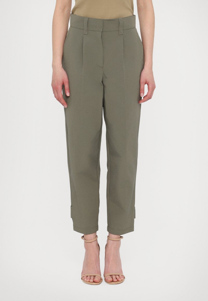 Light olive green trousers with a wide-leg design, pleats in front, and cuffed hems, made from a smooth, structured fabric.