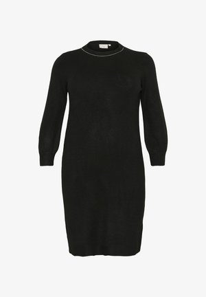 Melnā adīta kleita ar apaļu dekoltē, garām pūkainām piedurknēm un ribotām aprocēm. Gluda tekstūra ar vieglu sudraba akcentu ap dekoltē.