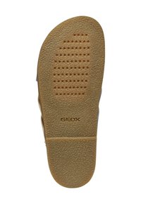 Bruine rubberen buitenzool met een gestructureerd oppervlak en ventilatiegaten, met het merk "GEOX" in reliëf bij de hiel.