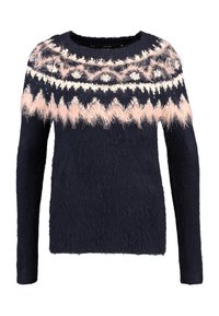 Mörkblå fluffig tröja med långa ärmar som har rosa och vita geometriska och zigzag-mönster runt oket och halsringningen.