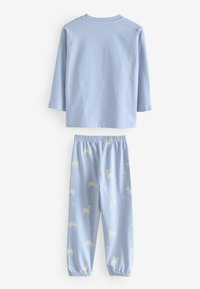 Light blue cotton pajama set featuring a long-sleeve top and elastic waist pants. Pants have white unicorn and star patterns.