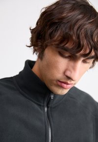 Nike Sportswear AIR - Φλις πουλόβερ - black/metallic gold