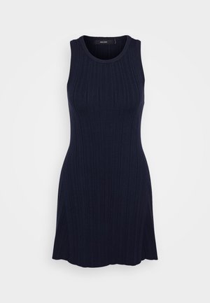 Ναυτικό αμάνικο φόρεμα από ριμπ ύφασμα. Εφαρμοστή κορσέ που ανοίγει ελαφρώς στο τελείωμα, με στρογγυλή λαιμόκοψη και υφασμάτινο μοτίβο.